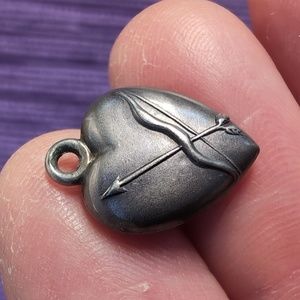 Antique sterling silver puffed heart charm